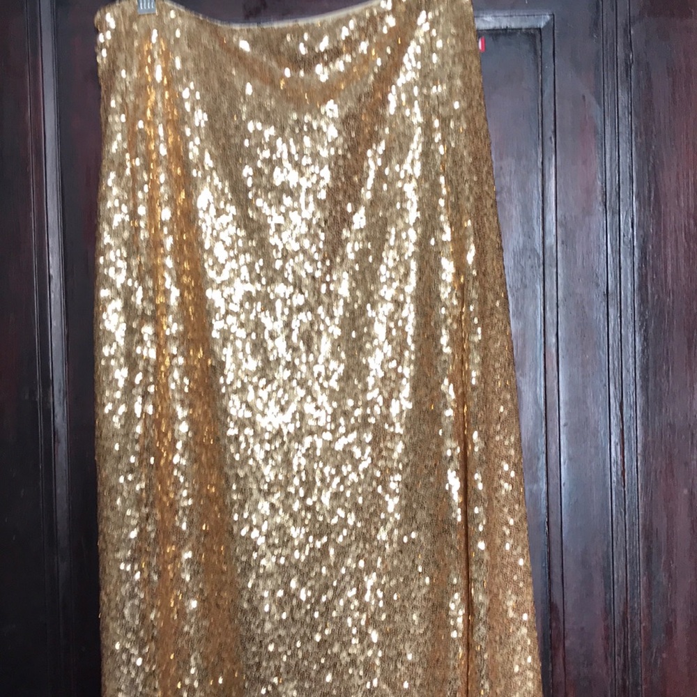 New with tags, Reformation gold, sequined skirt.